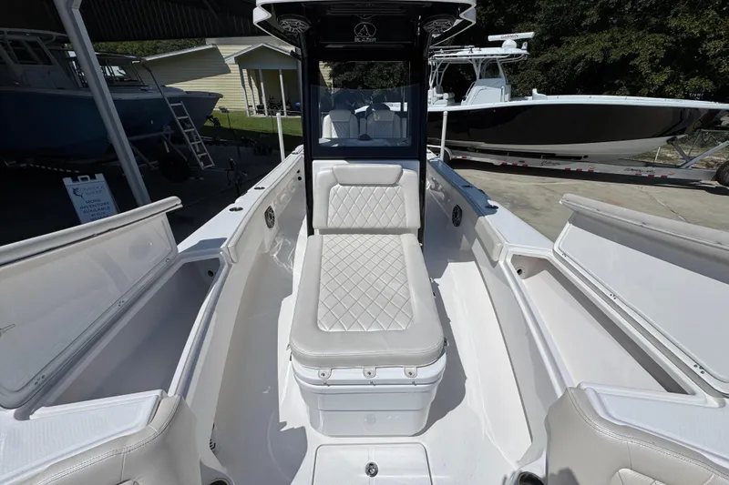 Slide: The Image of 2026 Blazer 2800 Makaira boat interior with cushioned seating and sleek design. - 27