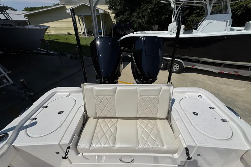 Slide: The Image of 2026 Blazer 2800 Makaira boat with dual engines and cushioned seating. - 40