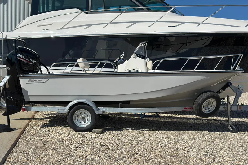 The Image of 2026 Boston Whaler 170 Montauk boat on trailer, displayed outdoors. - 0