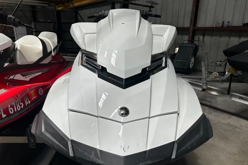 Slide: The Image of 2015 Yamaha WaveRunner VX 110 Cruiser in a storage facility. - 2