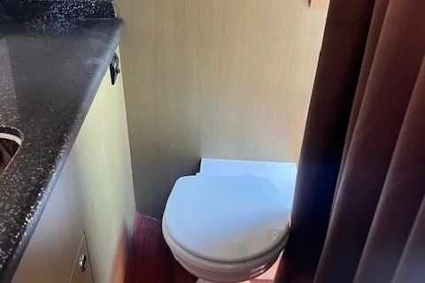 Slide: The Image of Compact bathroom in 2024 Bracewell 25 model with modern fixtures. - 11