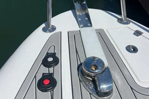 Slide: The Image of 2024 Bracewell 25 boat deck with cleats and winch, featuring sleek design elements. - 18