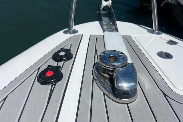 Slide: The Image of 2024 Bracewell 25 boat deck with cleat and control buttons. - 20