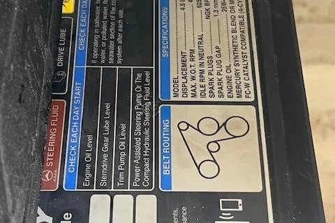 Slide: The Image of Label with specifications and belt routing diagram for 2024 Bracewell 25 model. - 25