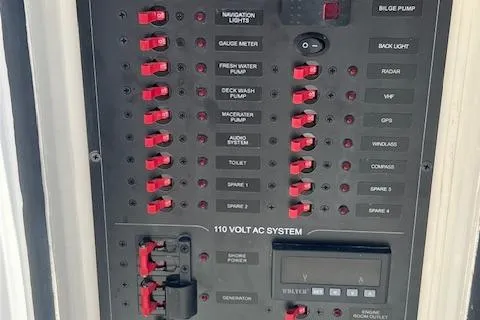 Slide: The Image of Electrical control panel of a 2024 Bracewell 25 boat with labeled switches and indicators. - 29