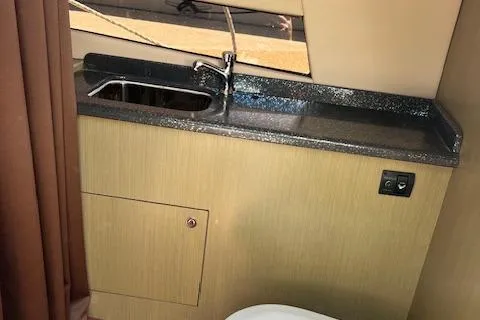 Slide: The Image of 2024 Bracewell 25 boat interior with sink and countertop. - 9