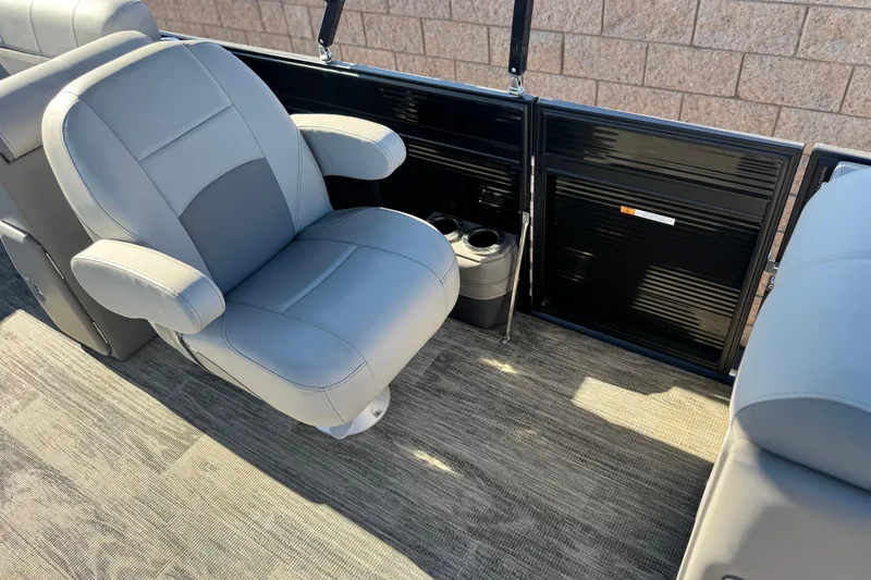 Slide: The Image of Luxurious seating on 2023 Apex Qwest 822 boat with modern design and cup holders. - 13