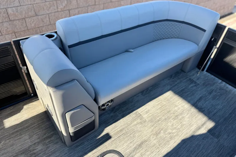 Slide: The Image of Gray seating area on 2023 Apex Qwest 822 boat, featuring modern design and comfortable upholstery. - 10