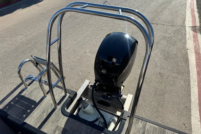 Slide: The Image of 2023 Apex Qwest 822 boat with outboard motor and stainless steel ladder. - 17