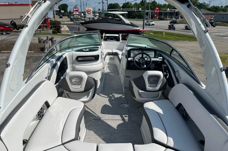 Slide: The Image of 2026 Crownline 270 SS boat interior with modern seating and dashboard. - 1