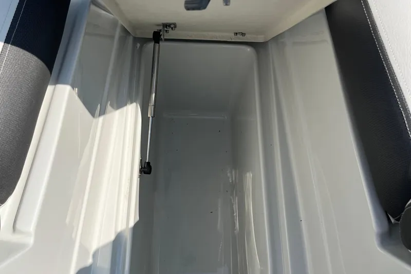 Slide: The Image of Storage compartment of 2026 Crownline 270 SS boat, featuring sleek interior design. - 10