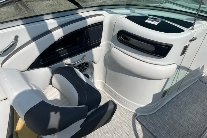 Slide: The Image of Interior of 2026 Crownline 270 SS boat, featuring sleek seating and modern design elements. - 11