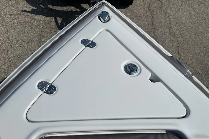 Slide: The Image of 2026 Crownline 270 SS boat deck with sleek design and stainless steel hinges. - 3