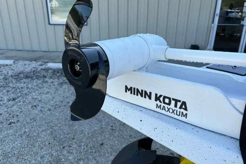 Slide: The Image of Minn Kota Maxxum motor on Xpress H20B 2026 boat, close-up view. - 11