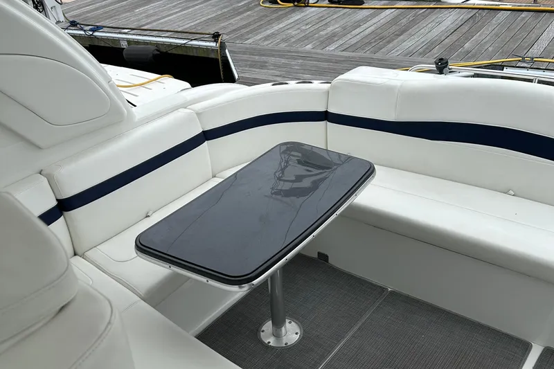 Slide: The Image of 2016 Formula 40 Cruiser interior with sleek seating and modern table design. - 14