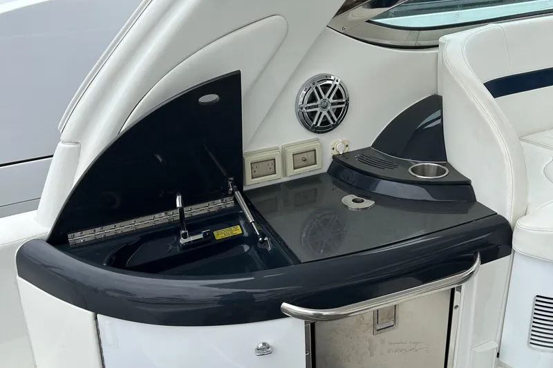 Slide: The Image of 2016 Formula 40 Cruiser yacht interior with sink, cup holder, and speaker. - 15