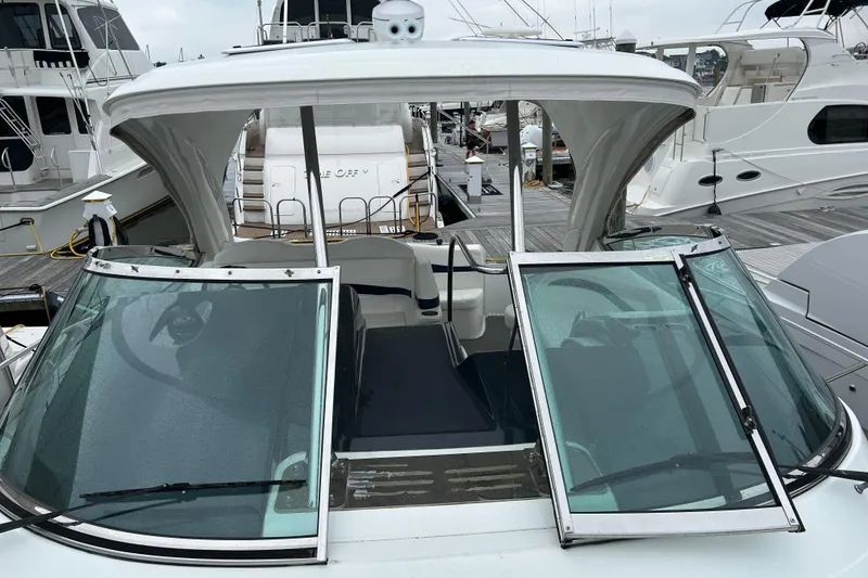 Slide: The Image of 2016 Formula 40 Cruiser yacht docked at marina, featuring open cockpit and sleek design. - 17