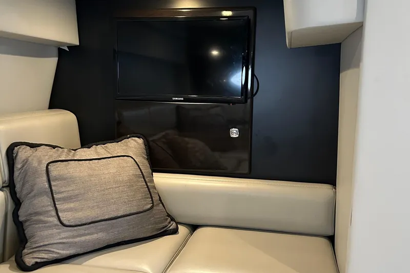 Slide: The Image of Interior of 2016 Formula 40 Cruiser with TV and cushioned seating. - 29