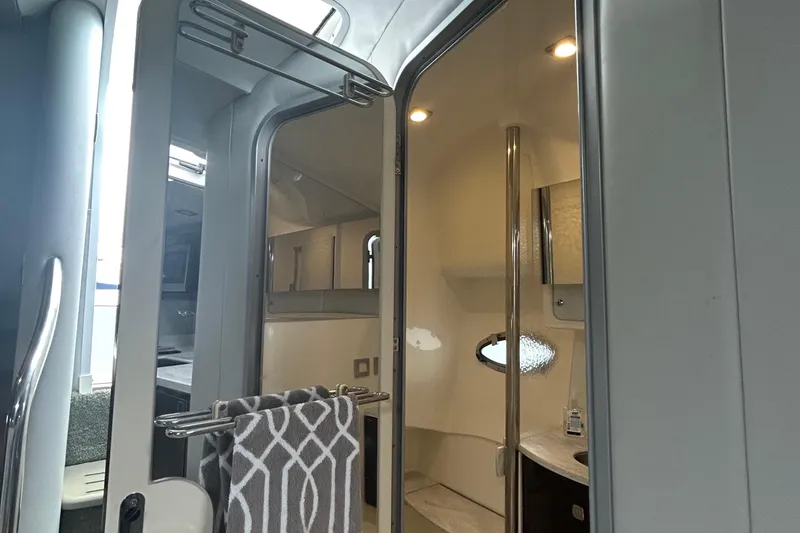 Slide: The Image of Interior of 2016 Formula 40 Cruiser yacht, featuring modern bathroom and sleek design. - 34