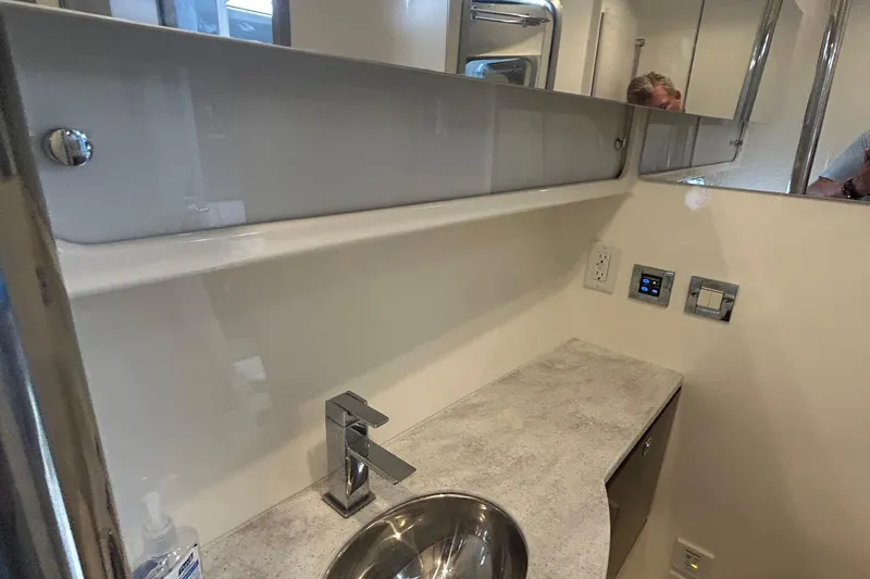 Slide: The Image of Modern bathroom interior of 2016 Formula 40 Cruiser yacht with sleek sink and fixtures. - 35