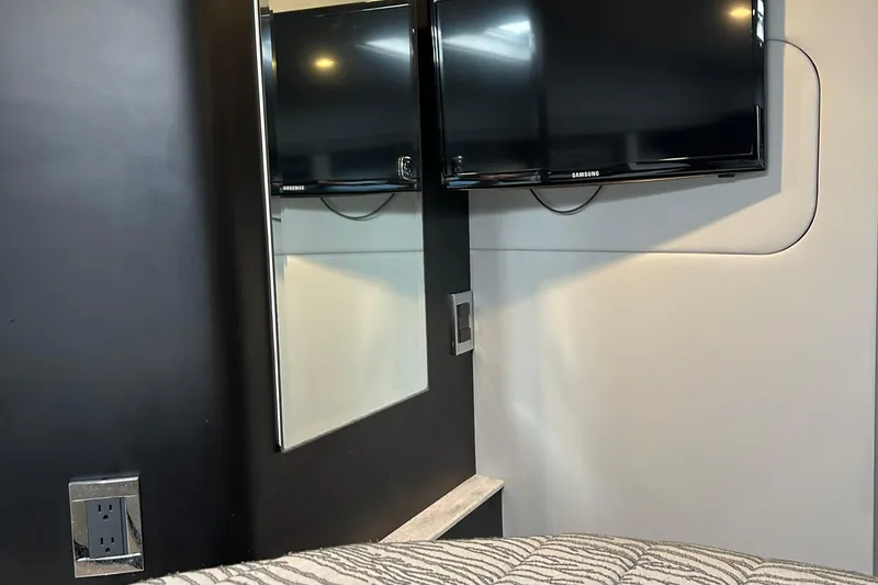 Slide: The Image of Interior of 2016 Formula 40 Cruiser with mounted TV and modern decor. - 49