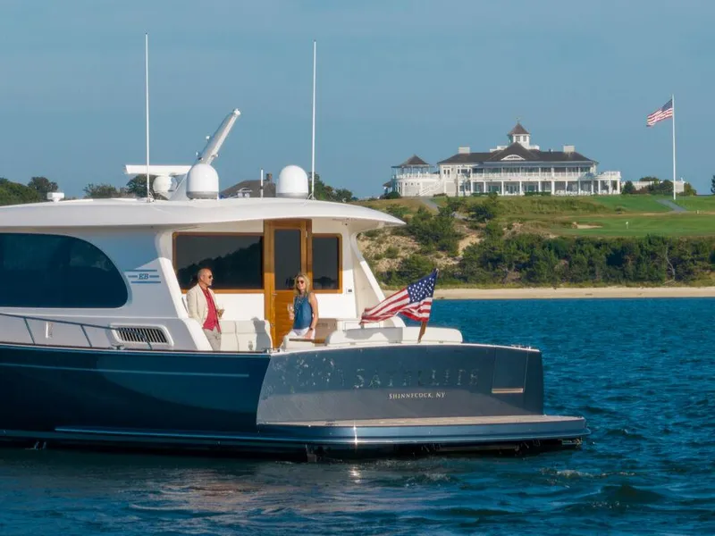 Slide: The Image of Luxurious 2023 Eastbay EB60 yacht interior with elegant seating and ocean view. - 16