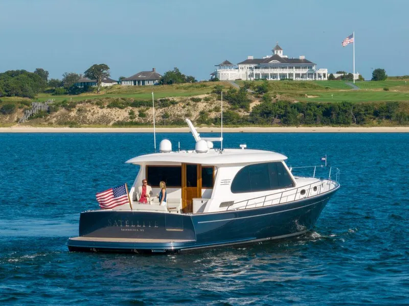 Slide: The Image of Luxurious 2023 Eastbay EB60 yacht interior with elegant seating and ocean view. - 17