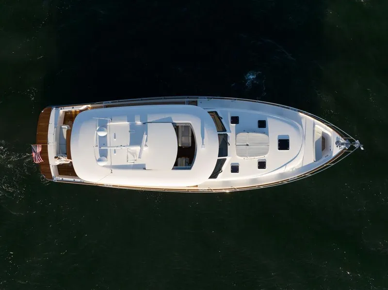 Slide: The Image of Luxurious 2023 Eastbay EB60 yacht cruising on open water. - 6