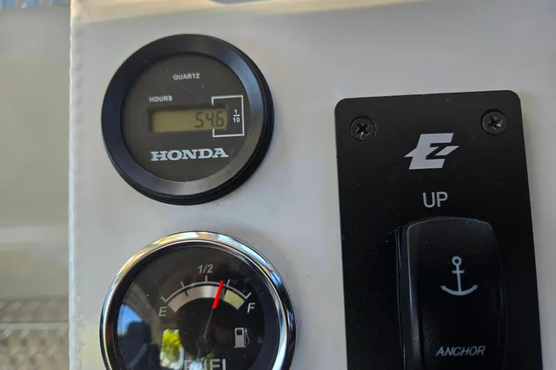 Slide: The Image of Honda hour meter and fuel gauge on Raider 210.Explorer, 2021 model. - 13