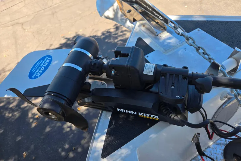 Slide: The Image of Minn Kota Terrova motor on 2021 Raider 210.Explorer boat, featuring Leelock anchor system. - 21