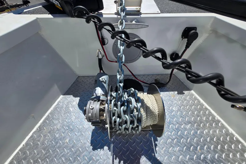 Slide: The Image of 2021 Raider 210.Explorer boat anchor winch on diamond plate deck. - 5
