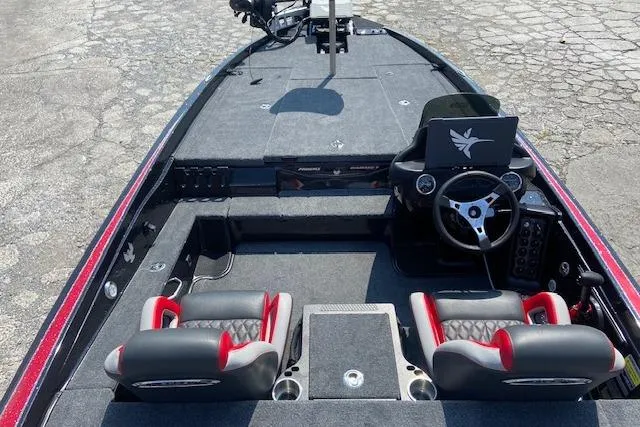 Slide: The Image of 2026 Phoenix 721xl boat interior with dual seats, steering wheel, and control panel. - 3