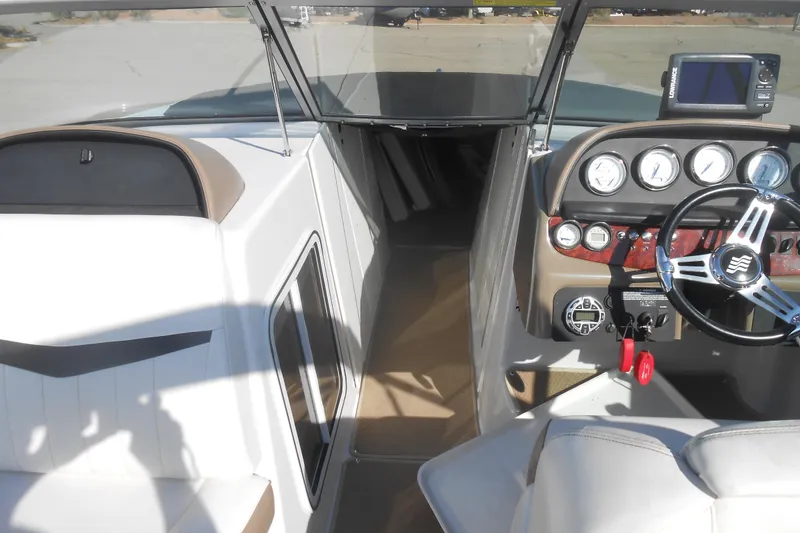 Slide: The Image of Close-up of 2008 Four Winns H Series H310 boat dashboard gauges. - 7