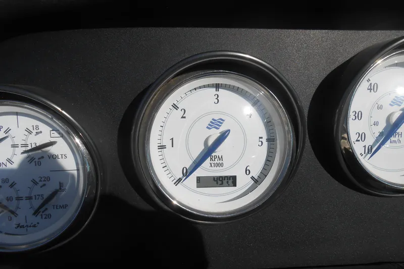 Slide: The Image of Tachometer of 2008 Four Winns H Series H310 boat showing RPM and hours. - 8
