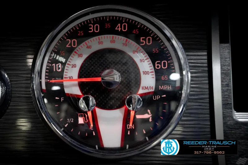 Slide: The Image of Close-up of 2020 Four Winns H210 speedometer, displaying speed in km/h and mph. - 35