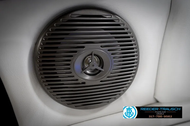 Slide: The Image of Close-up of a speaker in a 2020 Four Winns H210 boat interior. - 43