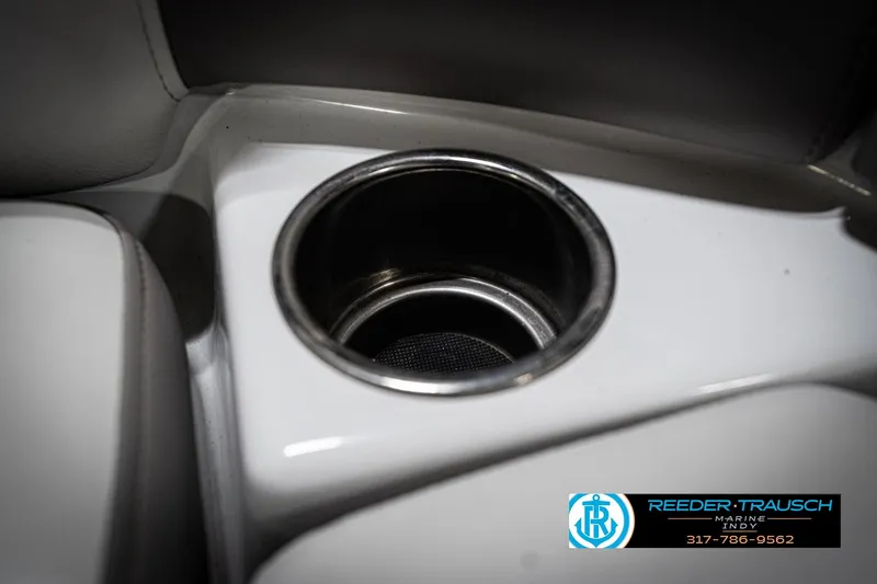 Slide: The Image of Cup holder in 2020 Four Winns H210 boat interior, featuring sleek design and comfort. - 44