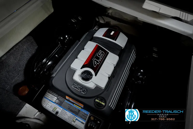 Slide: The Image of 2020 Four Winns H210 engine compartment with 4.5L 250 horsepower engine. - 47