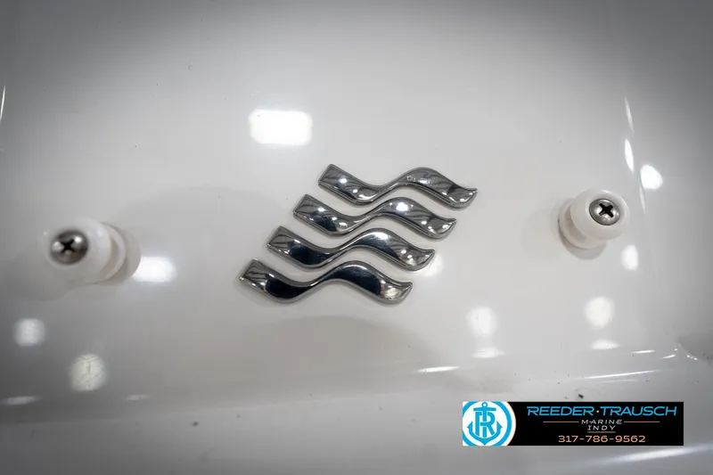 Slide: The Image of 2020 Four Winns H210 boat emblem with Reeder Trausch Marine logo. - 50