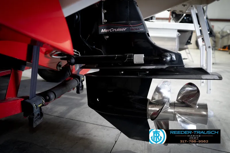 Slide: The Image of Rear view of a 2020 Four Winns H210 boat with MerCruiser engine. - 54