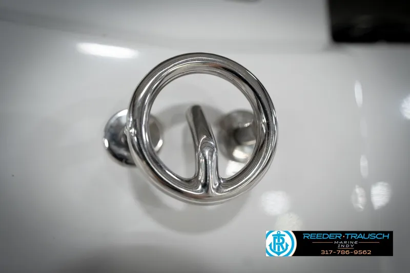 Slide: The Image of Stainless steel cleat on 2020 Four Winns H210 boat, Reeder Trausch Marine logo visible. - 61