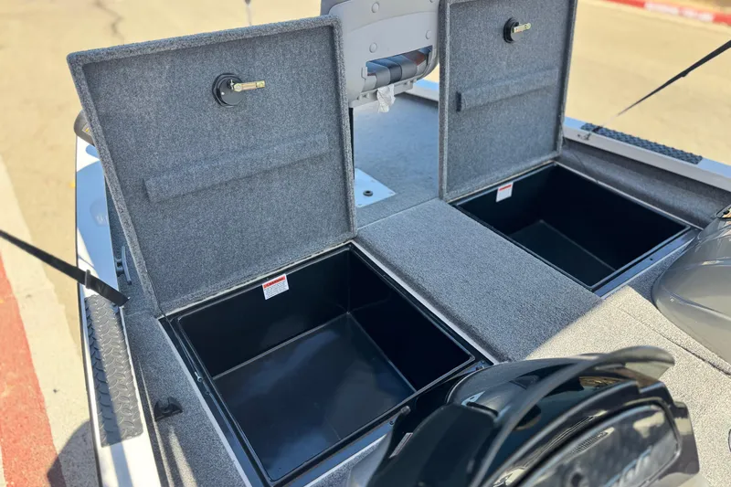 Slide: The Image of 2023 G3 SPORTSMAN 170 boat storage compartments open, showcasing interior space. - 12