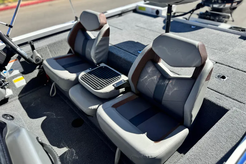 Slide: The Image of 2023 G3 SPORTSMAN 170 boat interior with dual seats and steering wheel. - 13