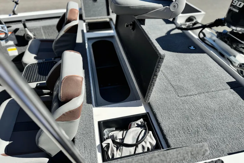 Slide: The Image of 2023 G3 SPORTSMAN 170 boat interior with seating and storage compartments. - 15