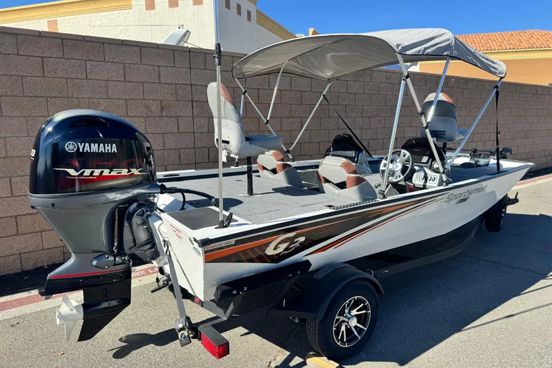 Slide: The Image of 2023 G3 SPORTSMAN 170 boat with Yamaha VMAX engine, parked outdoors. - 5