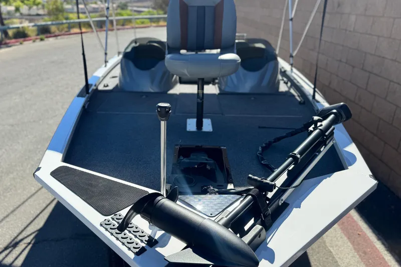 Slide: The Image of 2023 G3 SPORTSMAN 170 boat with trolling motor and seating on deck. - 7