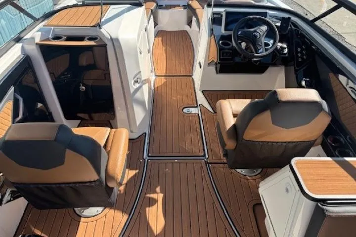 Slide: The Image of 2026 Yamaha Boats 252SD interior with sleek design and luxurious seating. - 13