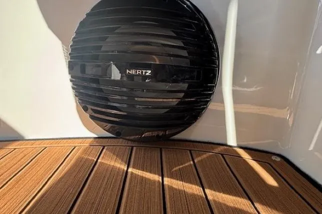 Slide: The Image of 2026 Yamaha Boats 252SD with Hertz speaker on teak deck. - 27