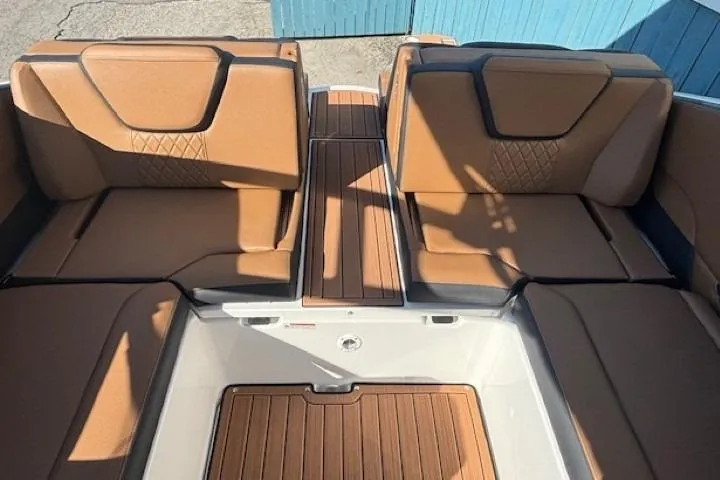 Slide: The Image of 2026 Yamaha Boats 252SD interior with tan seating and wood accents. - 28
