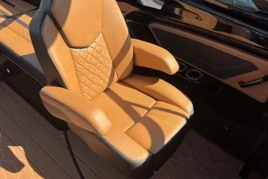 Slide: The Image of Luxury tan seat on 2026 Yamaha Boats 255XD, featuring elegant design and premium materials. - 18